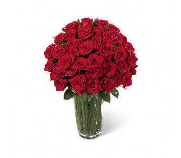 L'arrangement Luxueux de Roses Rouges